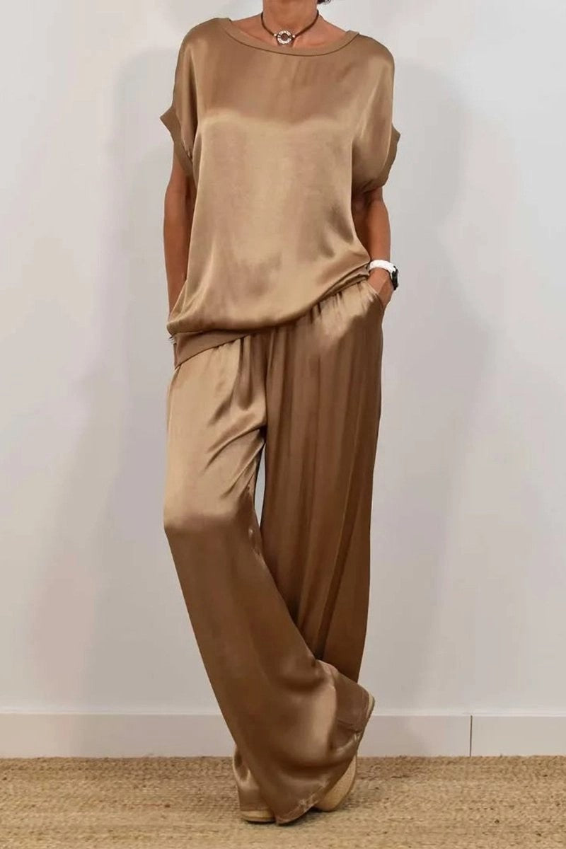 Conjunto de dos piezas de camiseta holgada de manga corta y pantalón ancho de color liso para mujer