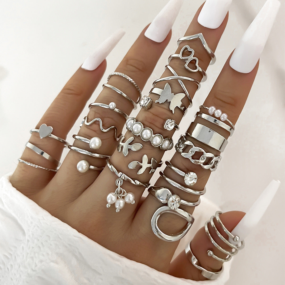 Conjunto de anillos multiarticulados con diseño geométrico de gotas de aceite para mujer