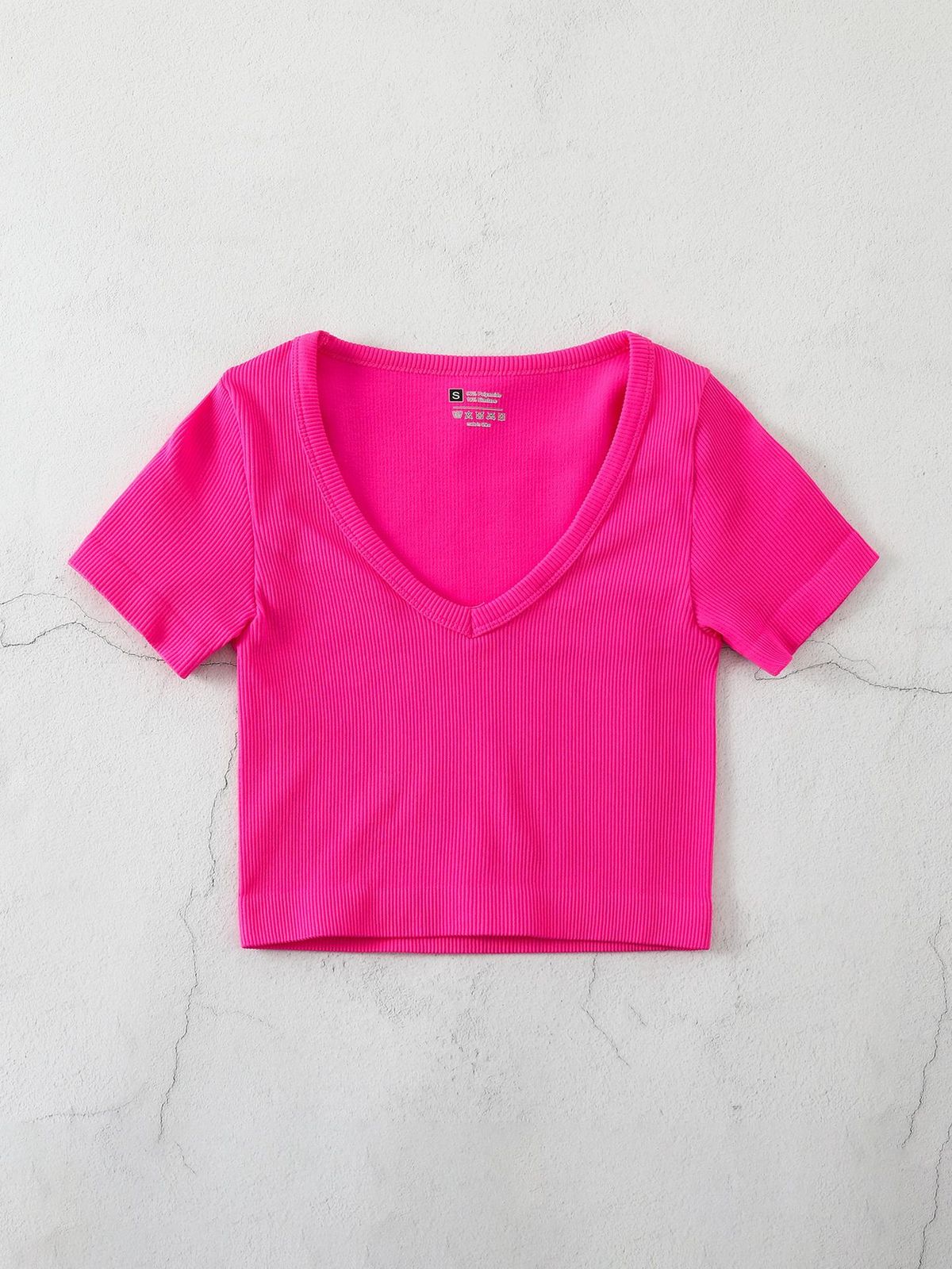 Camiseta de yoga informal de color liso con cuello en V para mujer