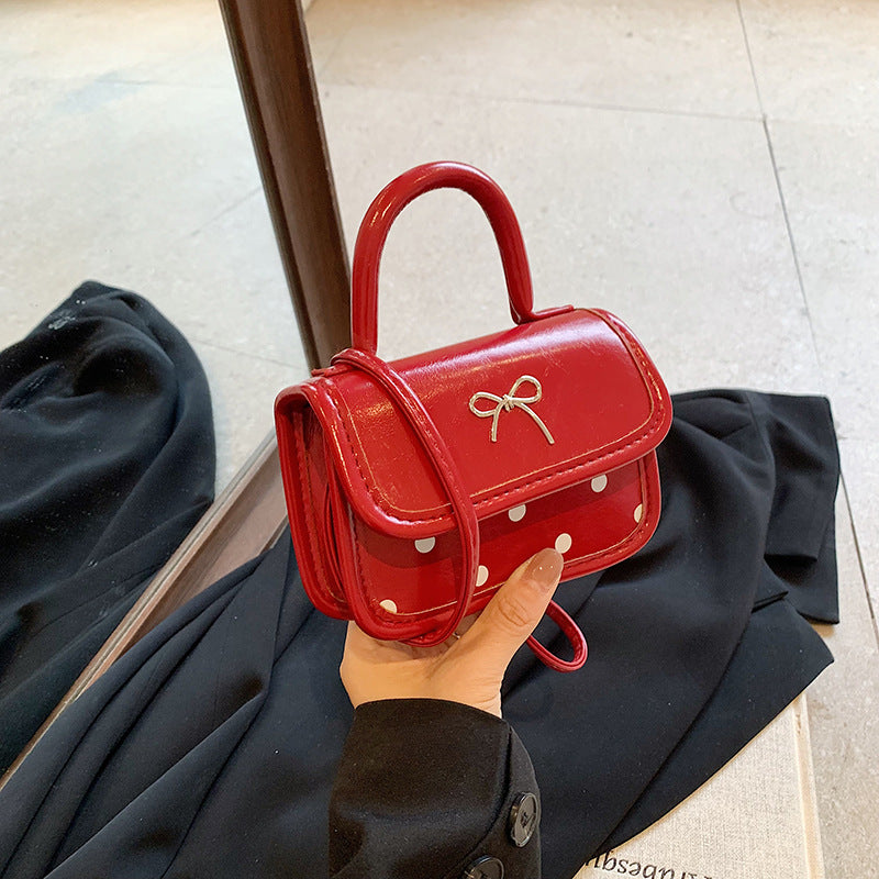 Mini bolso bandolera cuadrado con lazo de moda