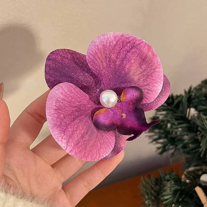 Accesorios florales para el cabello con mariposas para la playa