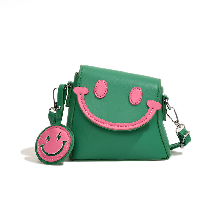 Lindo bolso bandolera mini con carita sonriente de dibujos animados