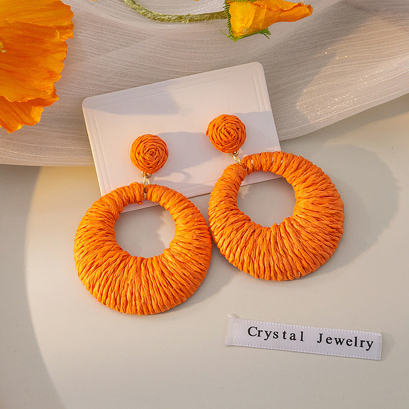 Boucles d'oreilles rondes creuses tissées de style bohème pour les fêtes