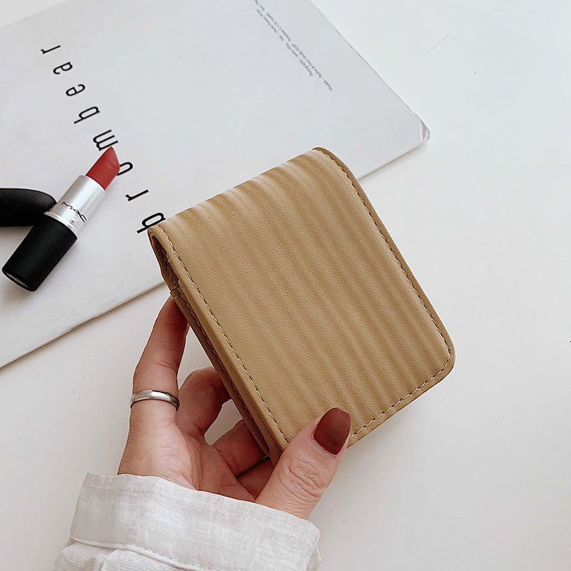 Mini trousse de maquillage portable simple et de couleur unie pour femme