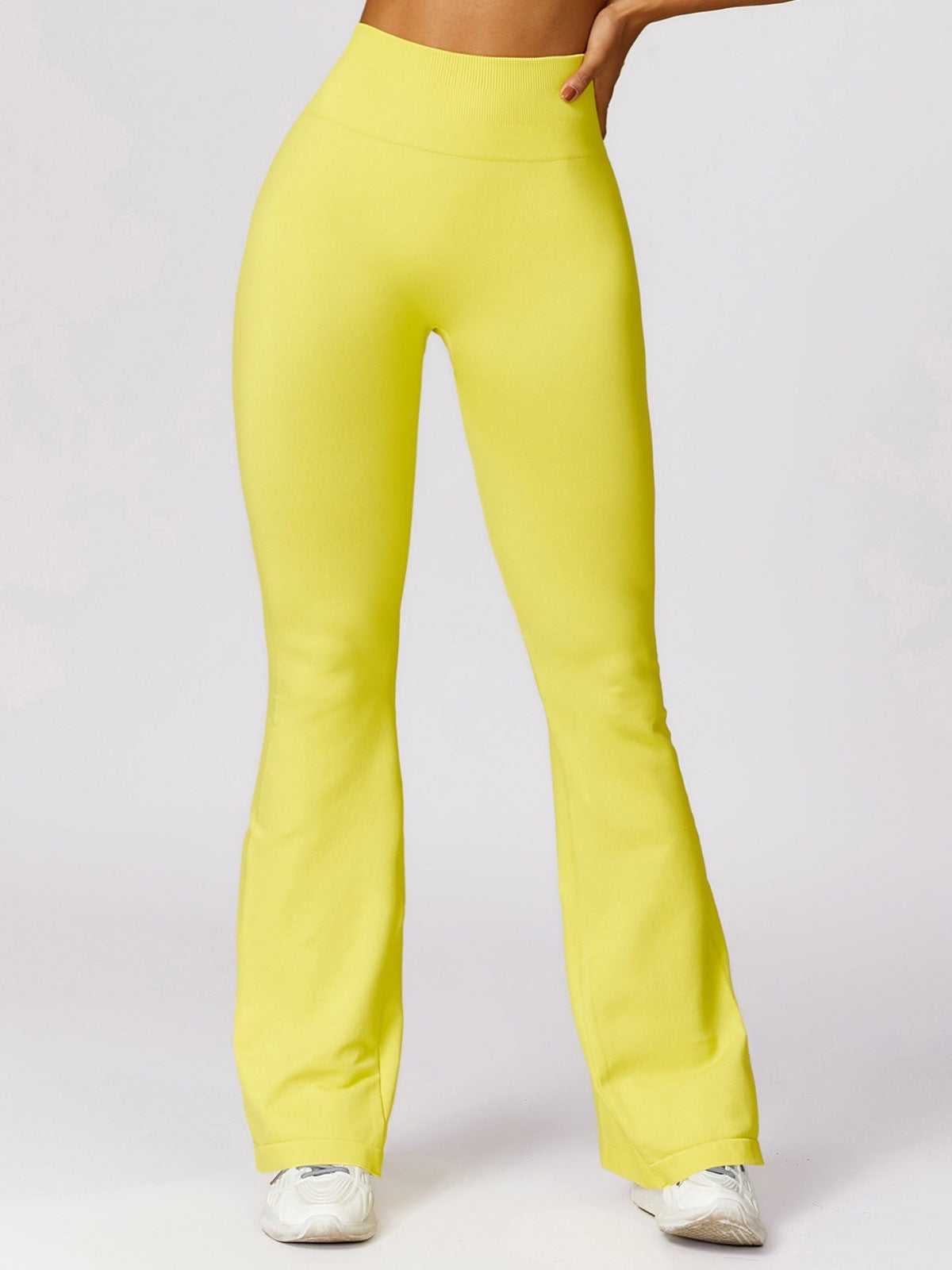 Pantalones deportivos acampanados de color liso de moda de yoga para mujer