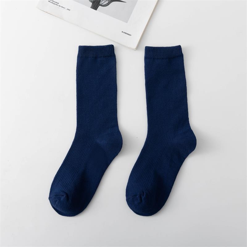 Calcetines de tubo de color liso sencillos a la moda para mujer