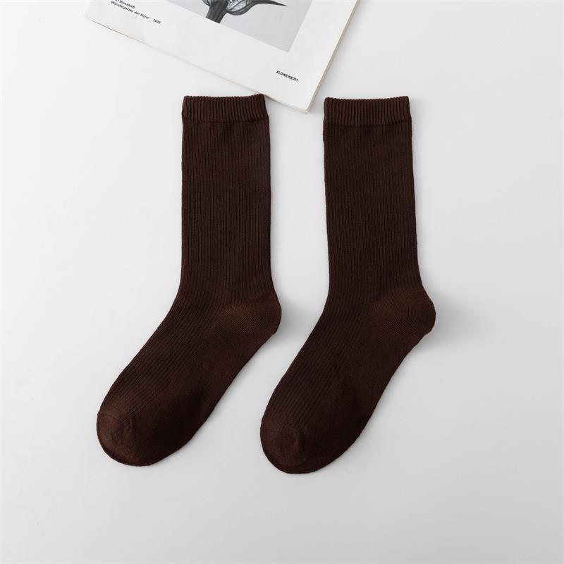 Calcetines de tubo de color liso sencillos a la moda para mujer