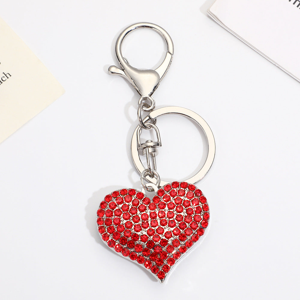 Llavero con colgante de corazón de diamantes de imitación para mujer
