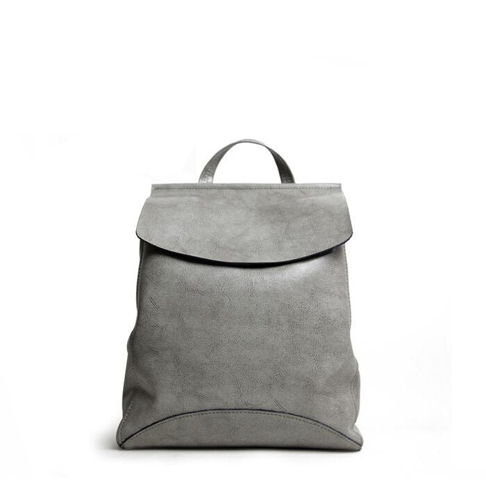 Mochila de cuero simple retro de color sólido para mujer
