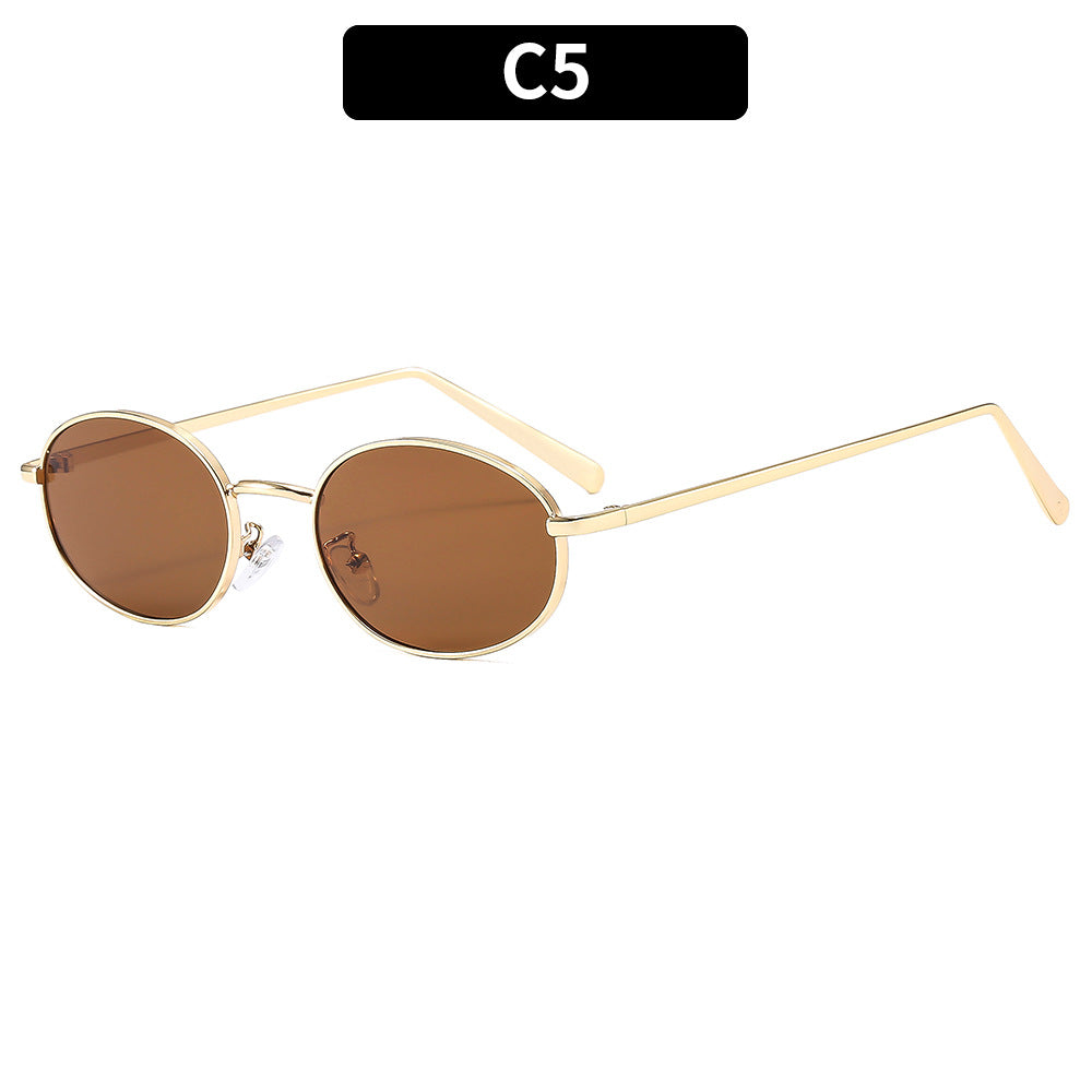 Gafas de sol ovaladas retro con montura metálica elegante