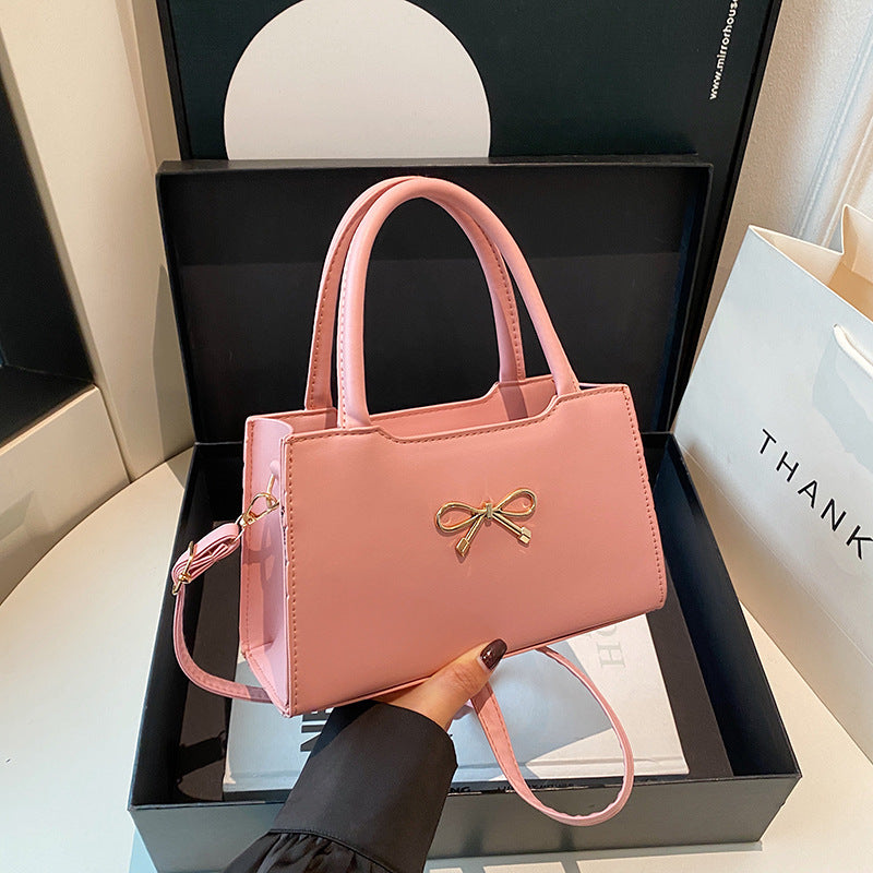 Bolso de mano informal de PU de color sólido con hebilla de lazo para mujer