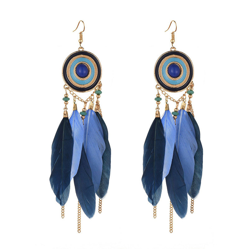 Pendientes bohemios con borlas de plumas exageradas