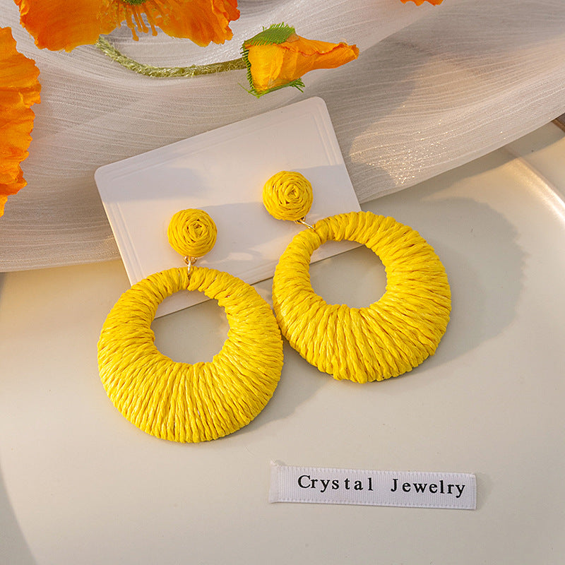 Boucles d'oreilles rondes creuses tissées de style bohème pour les fêtes