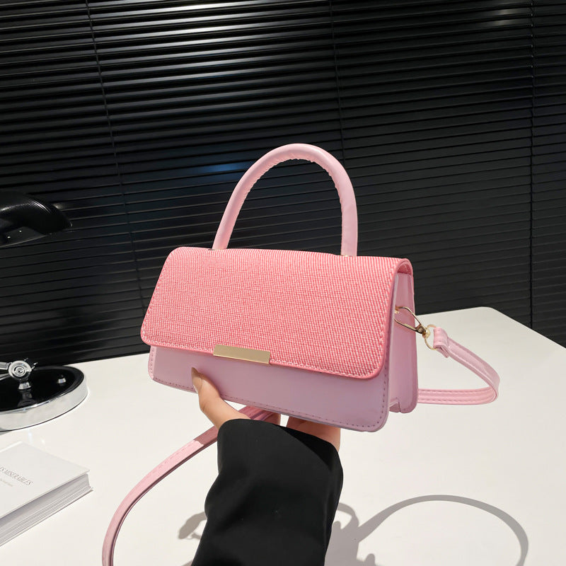 Bolso de mano con costuras abatibles de moda - Tendencia urbana