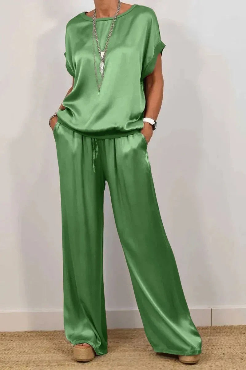 Conjunto de dos piezas de camiseta holgada de manga corta y pantalón ancho de color liso para mujer
