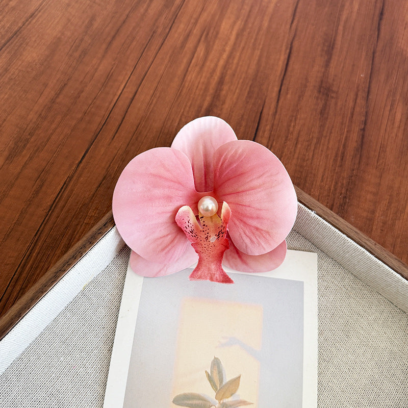 Accesorios florales para el cabello con mariposas para la playa