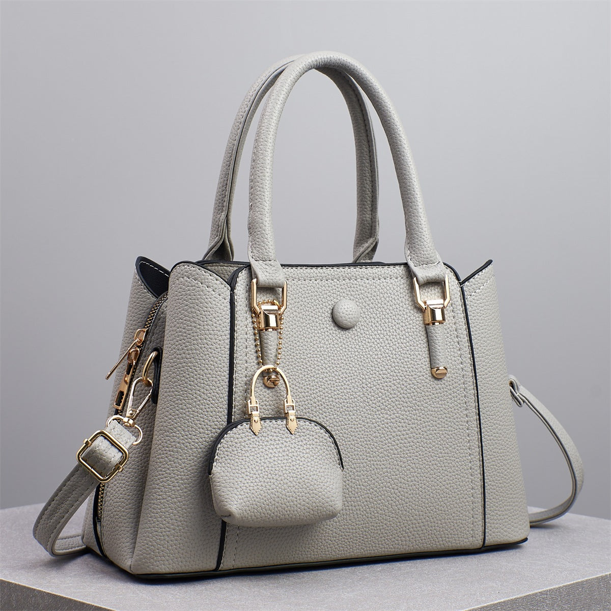 Bolso de mano informal de gran capacidad y color liso para mujer, con cierre de cremallera.