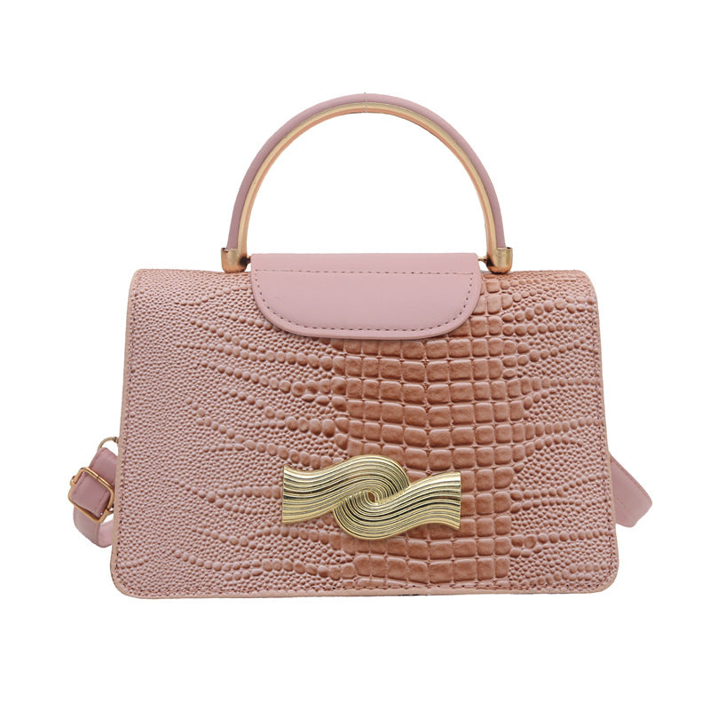 Bolso de piel de cocodrilo con hebilla de metal en color liso para mujer