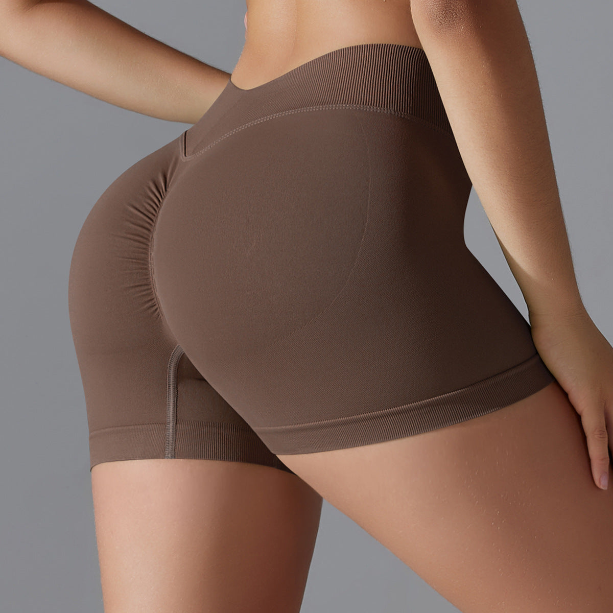Pantalones cortos deportivos de yoga de color sólido sin costuras sexys para mujer