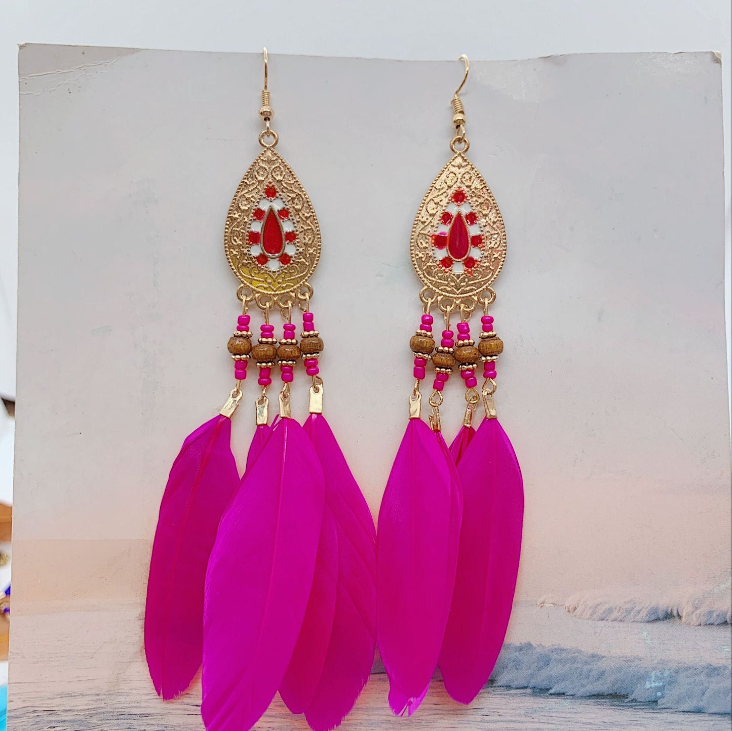 Boucles d'oreilles pendantes bohèmes vintage en perles et plumes