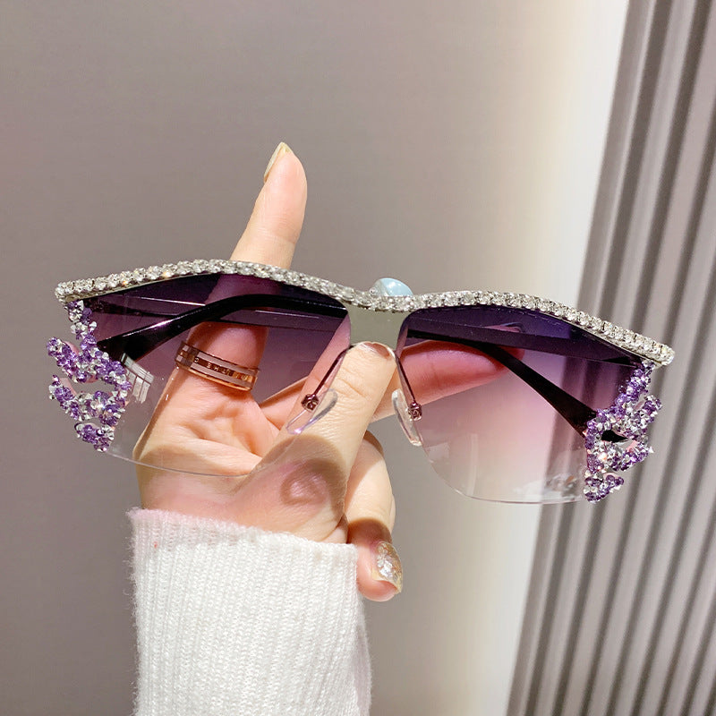 Gafas de sol sin montura con diamantes de imitación de metal irregulares de moda con un estilo único
