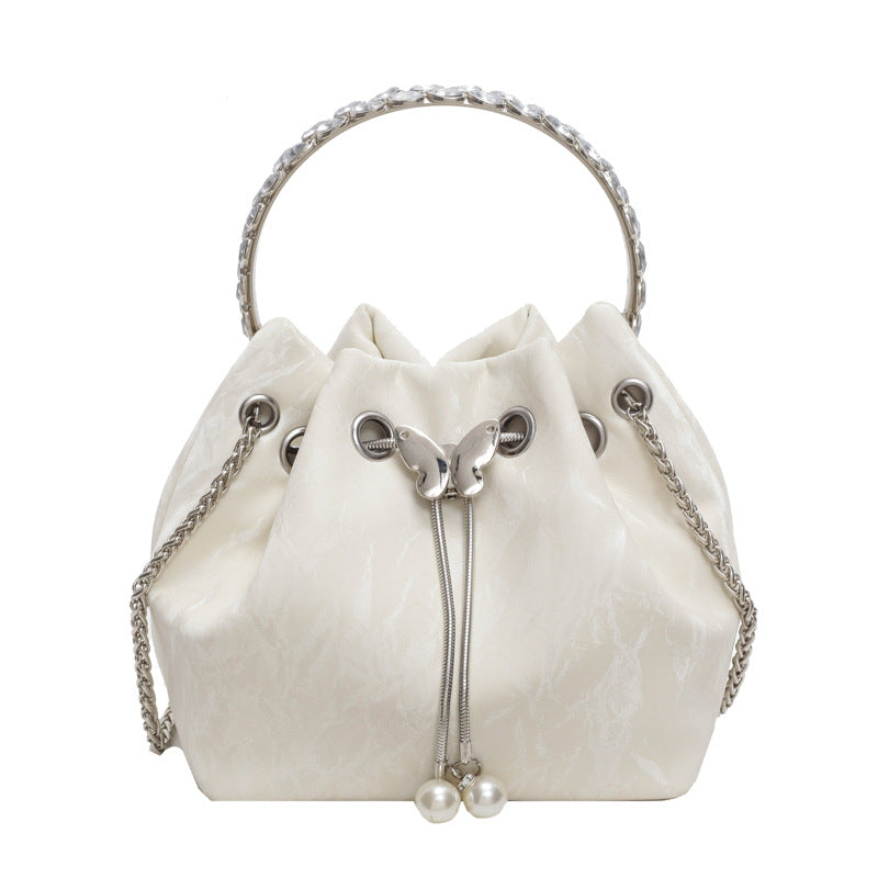 Bolso de mano elegante con cadena de mariposa plisada de color sólido para mujer