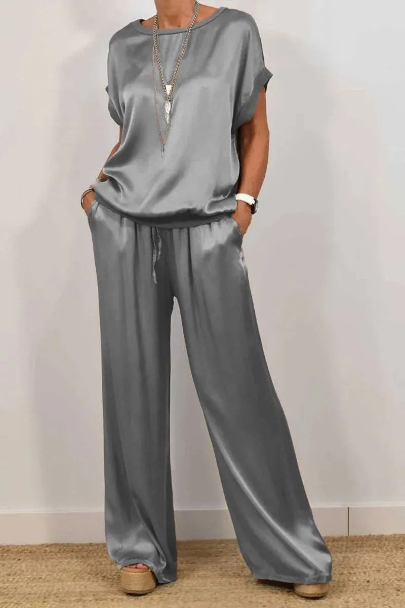 Conjunto de dos piezas de camiseta holgada de manga corta y pantalón ancho de color liso para mujer