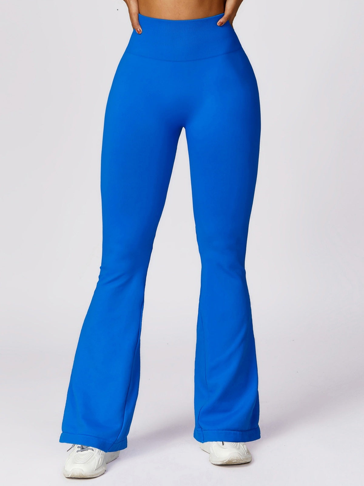 Pantalones deportivos acampanados de color liso de moda de yoga para mujer