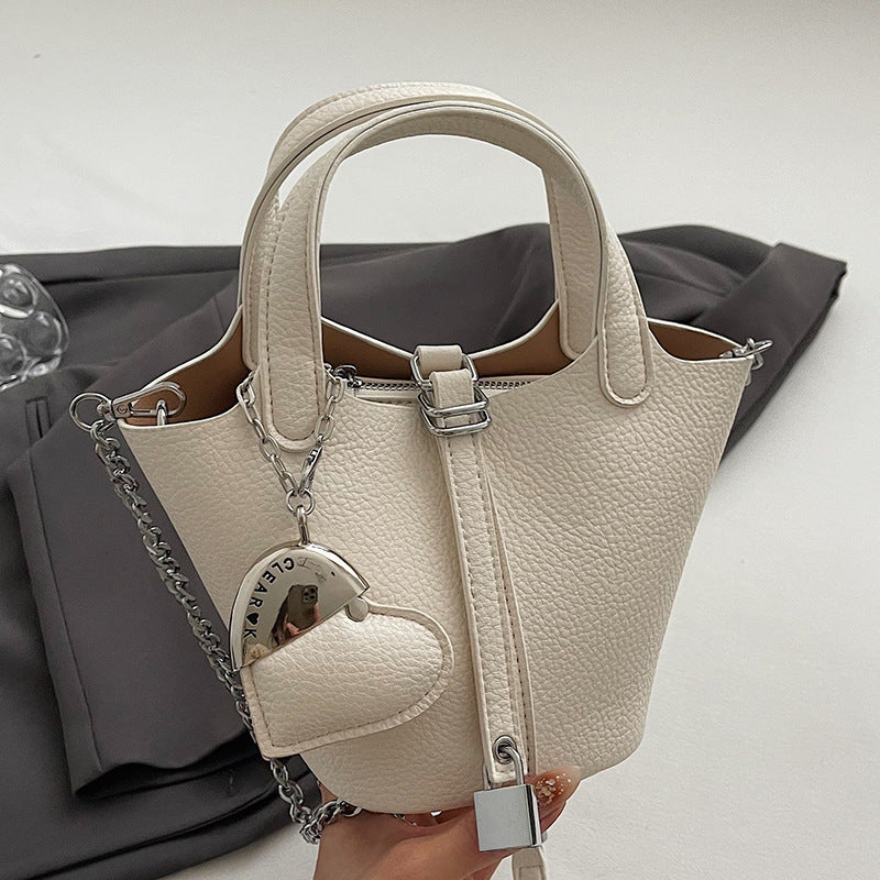 Sac à main simple et tendance pour femme, couleur unie, motif litchi, pendentif d'amour