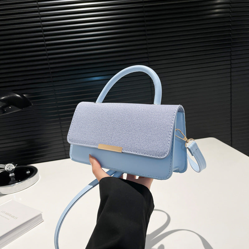 Bolso de mano con costuras abatibles de moda - Tendencia urbana