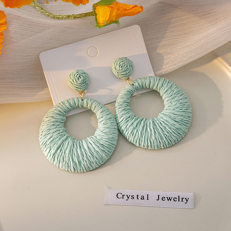 Boucles d'oreilles rondes creuses tissées de style bohème pour les fêtes