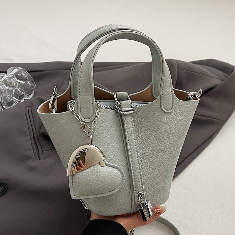 Sac à main simple et tendance pour femme, couleur unie, motif litchi, pendentif d'amour