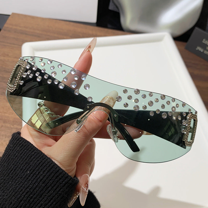 Gafas de sol de moda sin marco de un solo cuerpo con diamantes de imitación