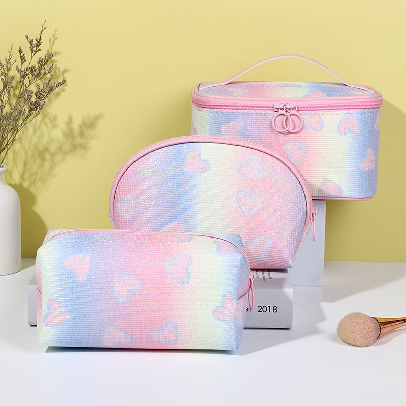 Bolsa de cosméticos con corazón arcoíris y degradado brillante