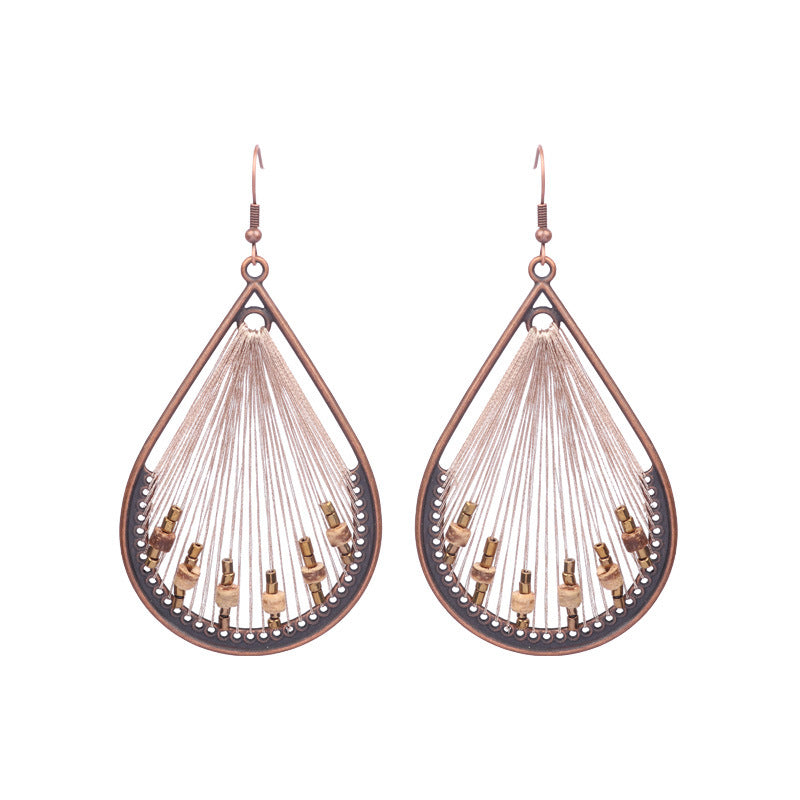 Boucles d'oreilles à pompons rétro de style ethnique bohème