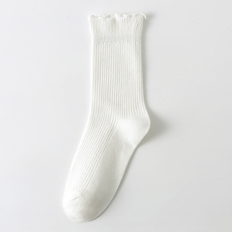 Calcetines casuales de algodón con borde rizado para mujer en colores lisos
