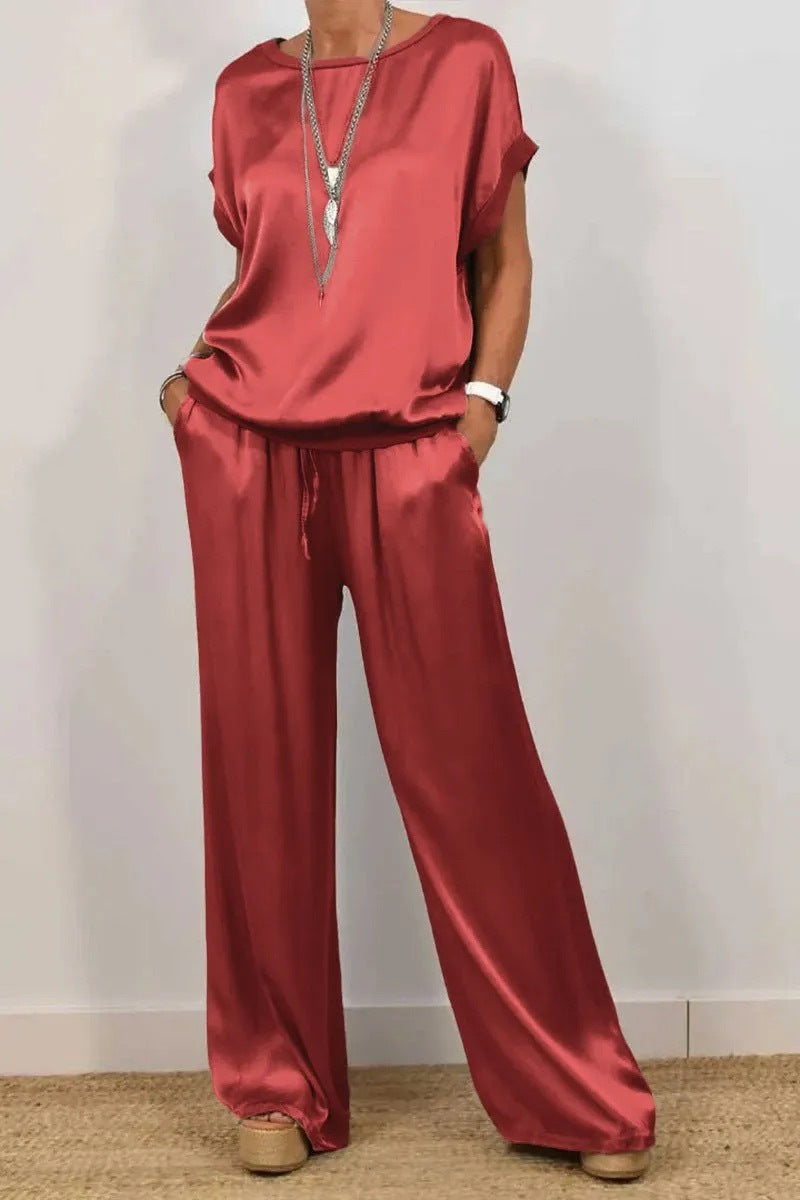 Conjunto de dos piezas de camiseta holgada de manga corta y pantalón ancho de color liso para mujer