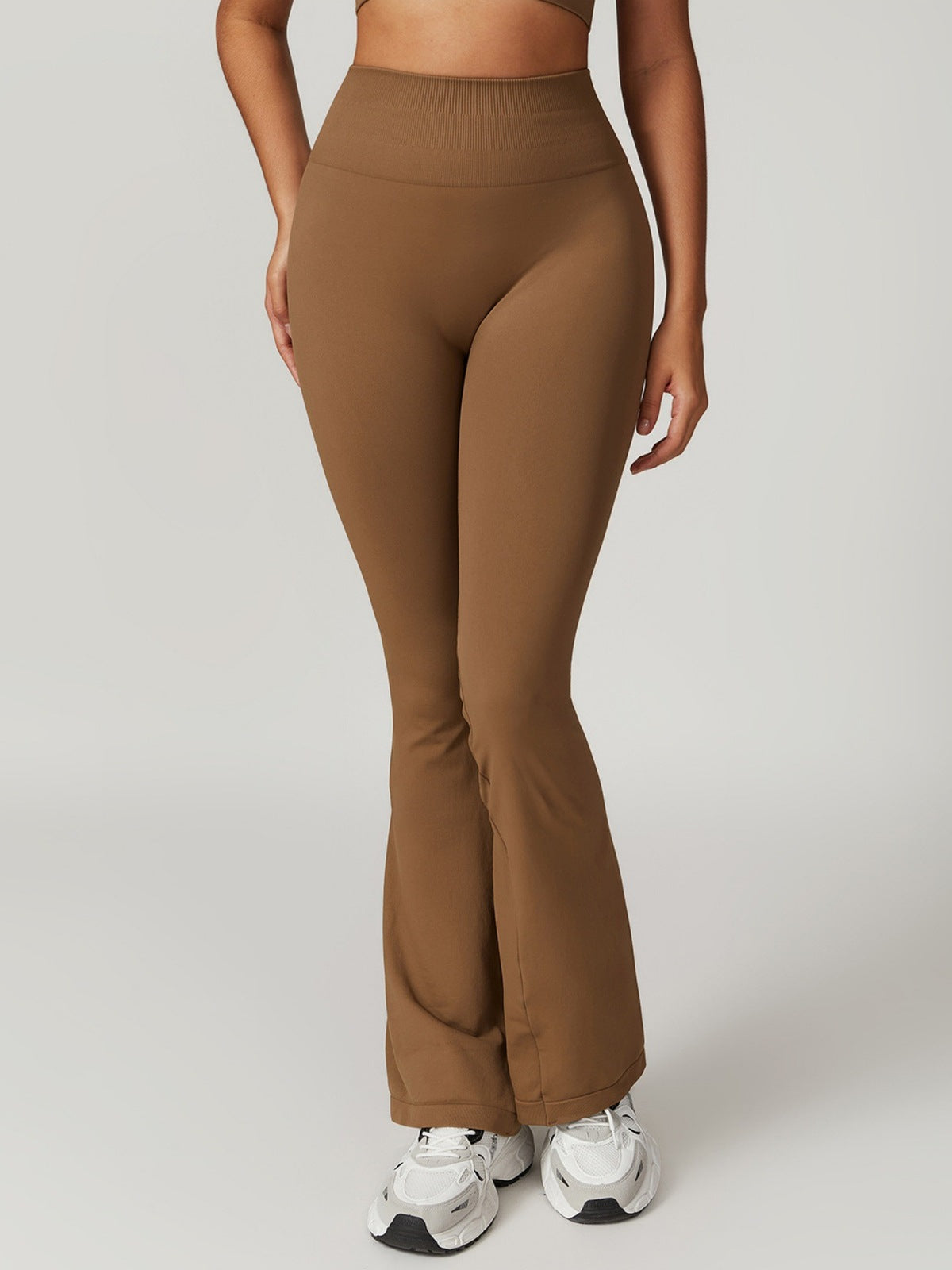 Pantalones deportivos acampanados de color liso de moda de yoga para mujer