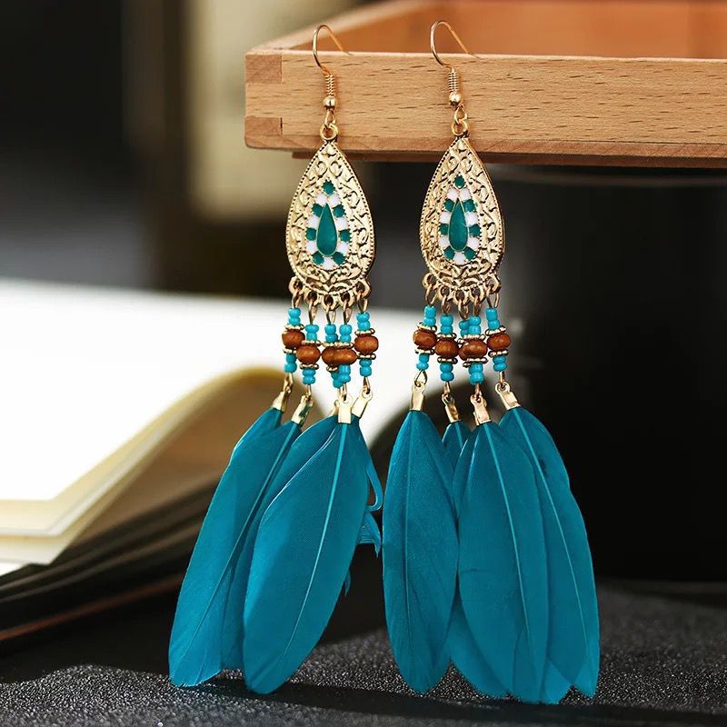 Boucles d'oreilles pendantes bohèmes vintage en perles et plumes