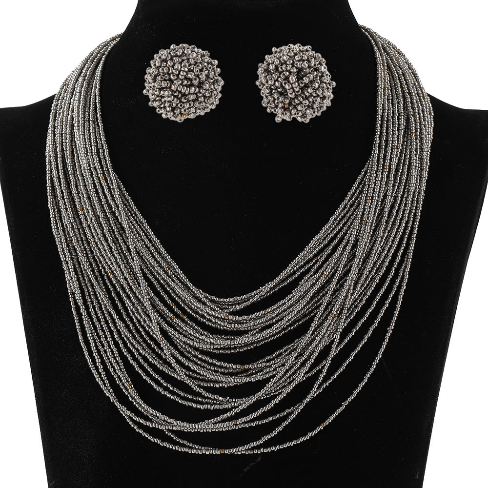 Conjunto de collar y pendientes con cuentas de arroz multicapa estilo bohemio para mujer
