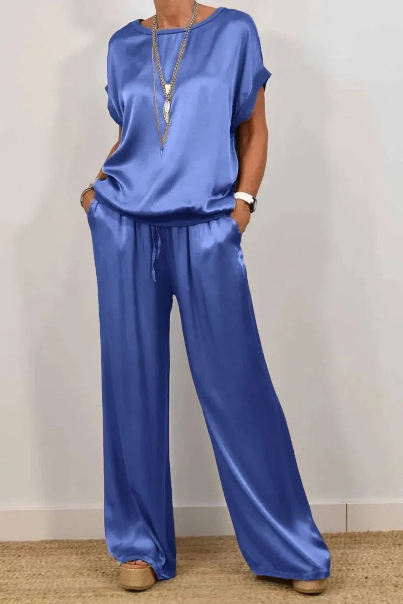 Conjunto de dos piezas de camiseta holgada de manga corta y pantalón ancho de color liso para mujer