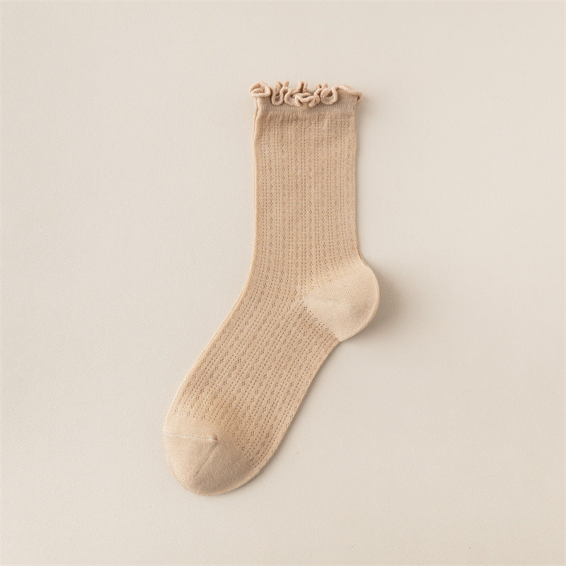 Chaussettes tendance à oreilles en bois de couleur unie