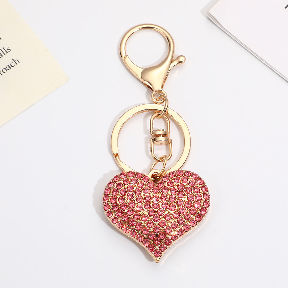 Llavero con colgante de corazón de diamantes de imitación para mujer