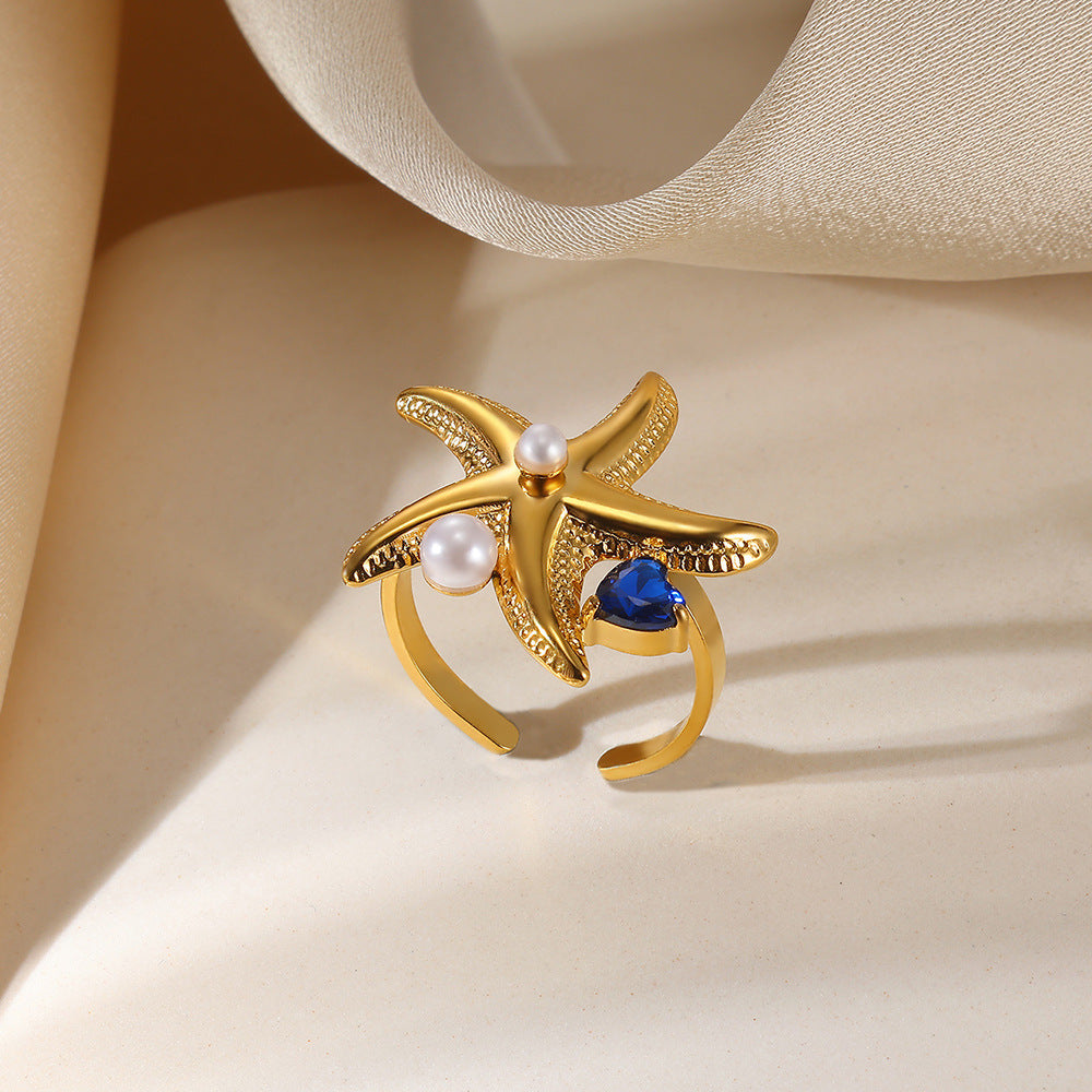 Anillo de amor con estrella de acero y titanio exagerado para mujer