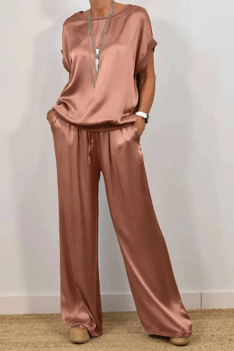 Conjunto de dos piezas de camiseta holgada de manga corta y pantalón ancho de color liso para mujer