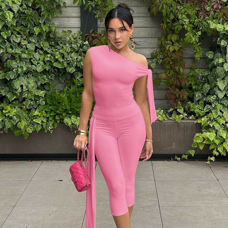 Conjunto de top y pantalones cortos sin mangas de color liso a la moda para mujer
