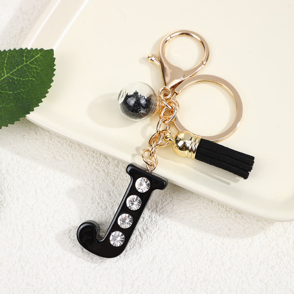 Llavero de resina negra con letras de diamantes de imitación, accesorio de arte moderno