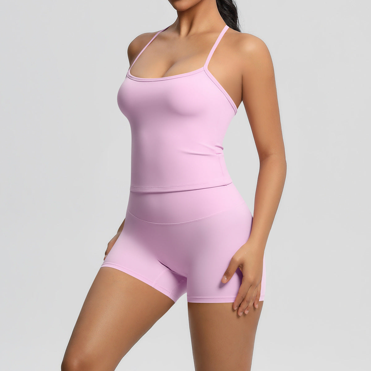 Conjunto de dos piezas de camiseta sin mangas informal con espalda descubierta y pantalones cortos ajustados para mujer