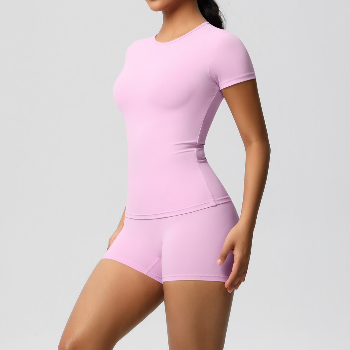 Ensemble de yoga décontracté pour femme, t-shirt à manches courtes et short moulant de couleur unie