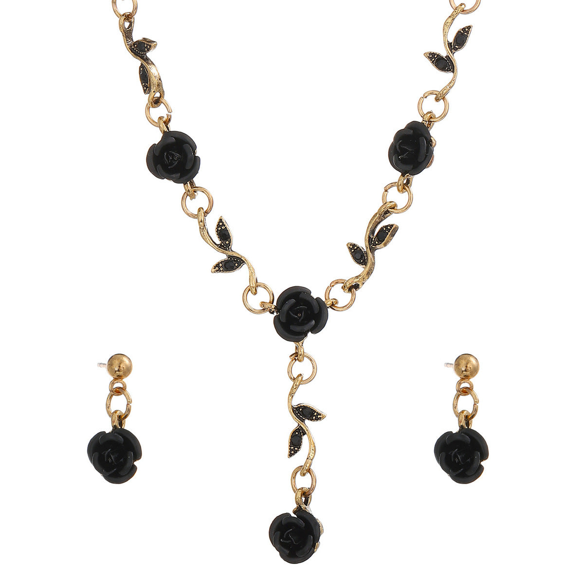 Conjunto de tres piezas de joyería floral con rosas vintage